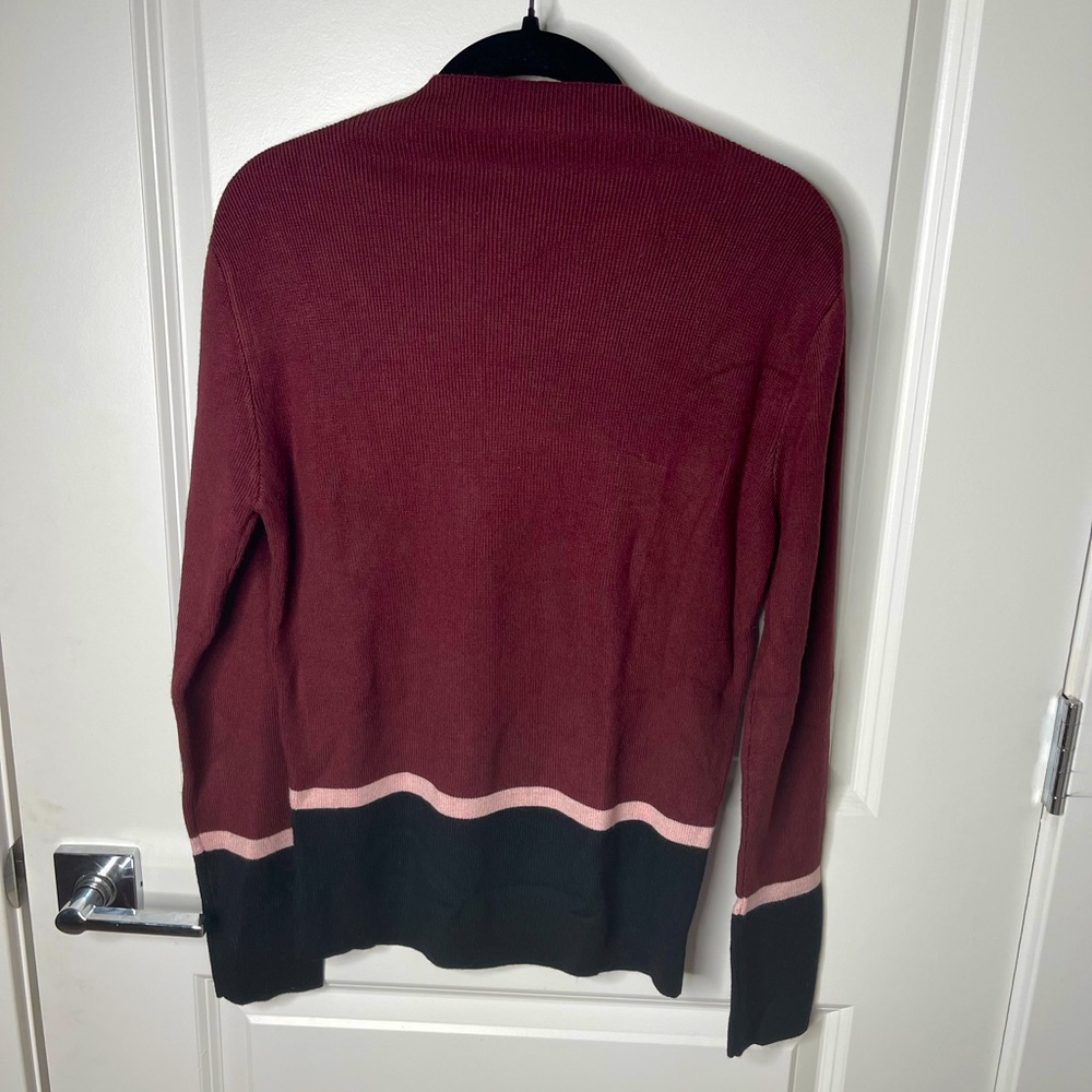 Clíche Turtleneck Sweater